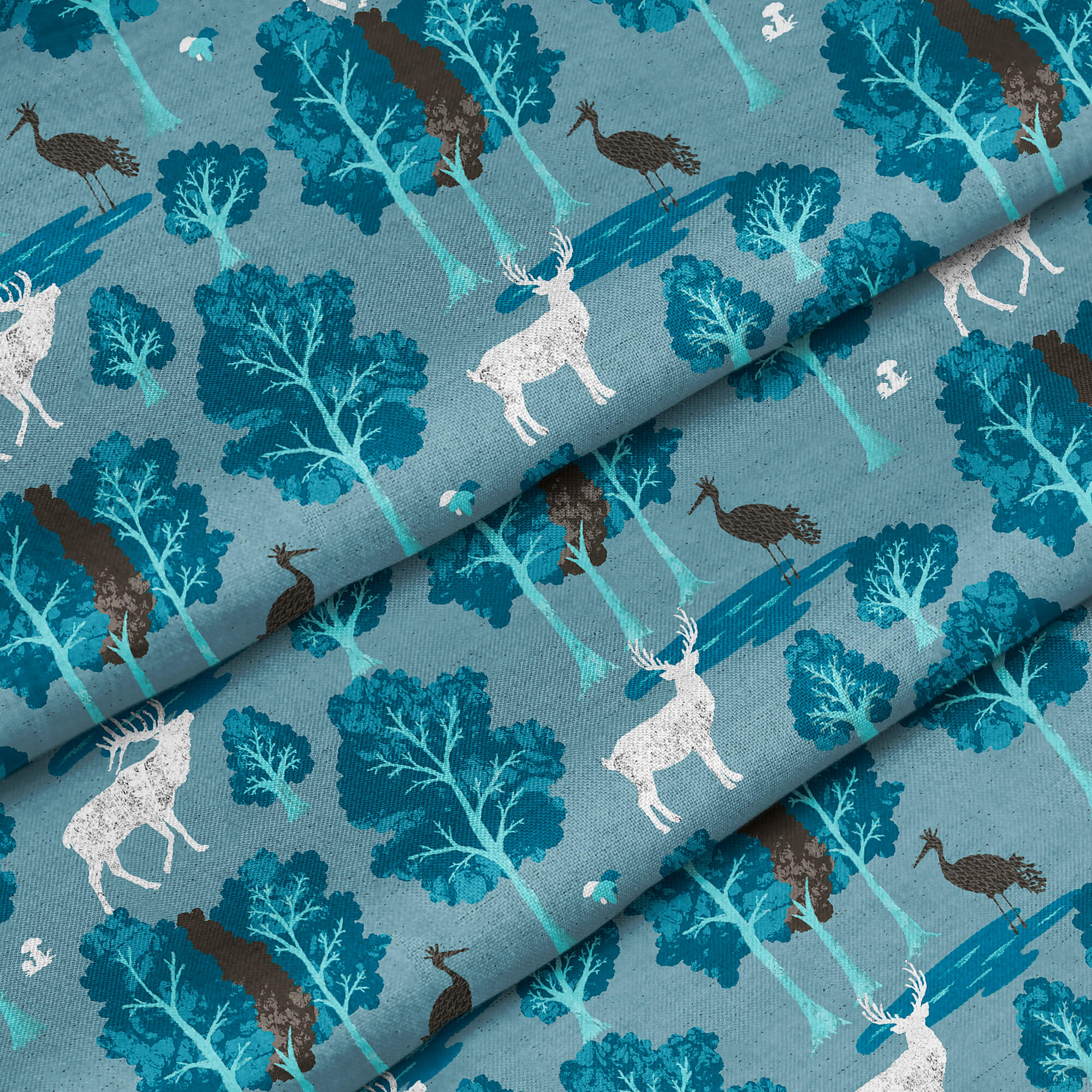 folded fabric with deer in blue forest design