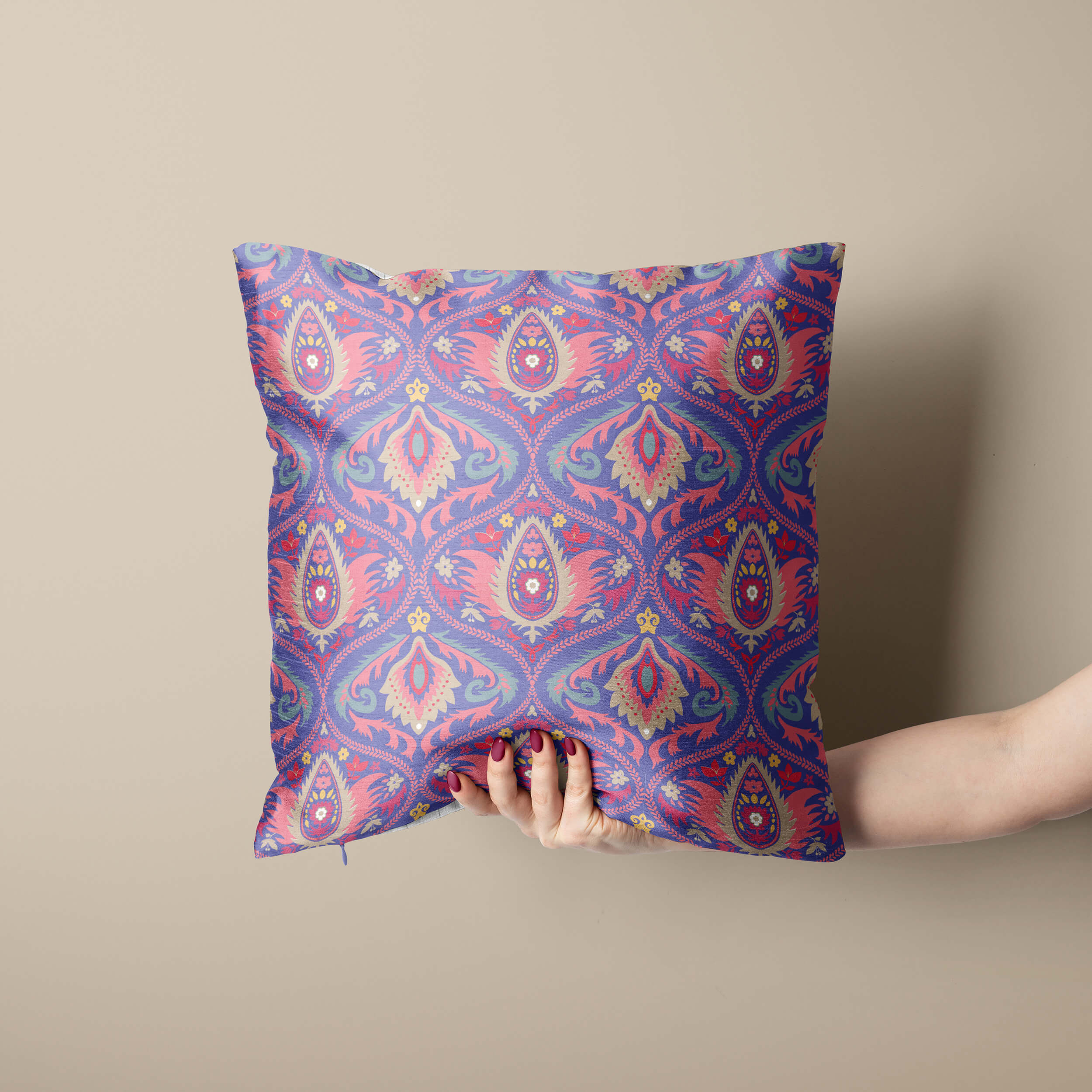 throw pillow with red and violet ogee pattern